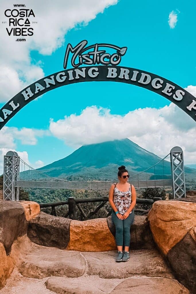 woman in front of arenal volcano at mistico