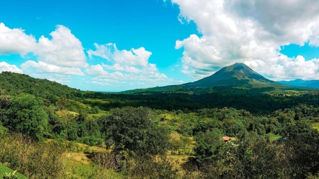 wide angle view of Arenal Volcano and valley