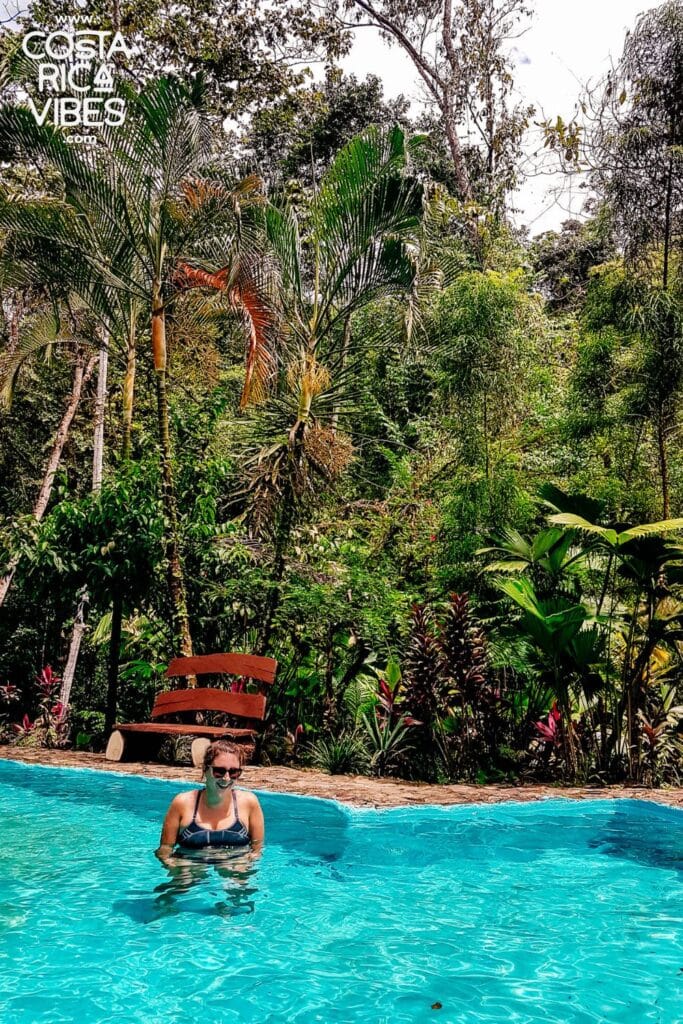 woman in la fortuna jungle pool