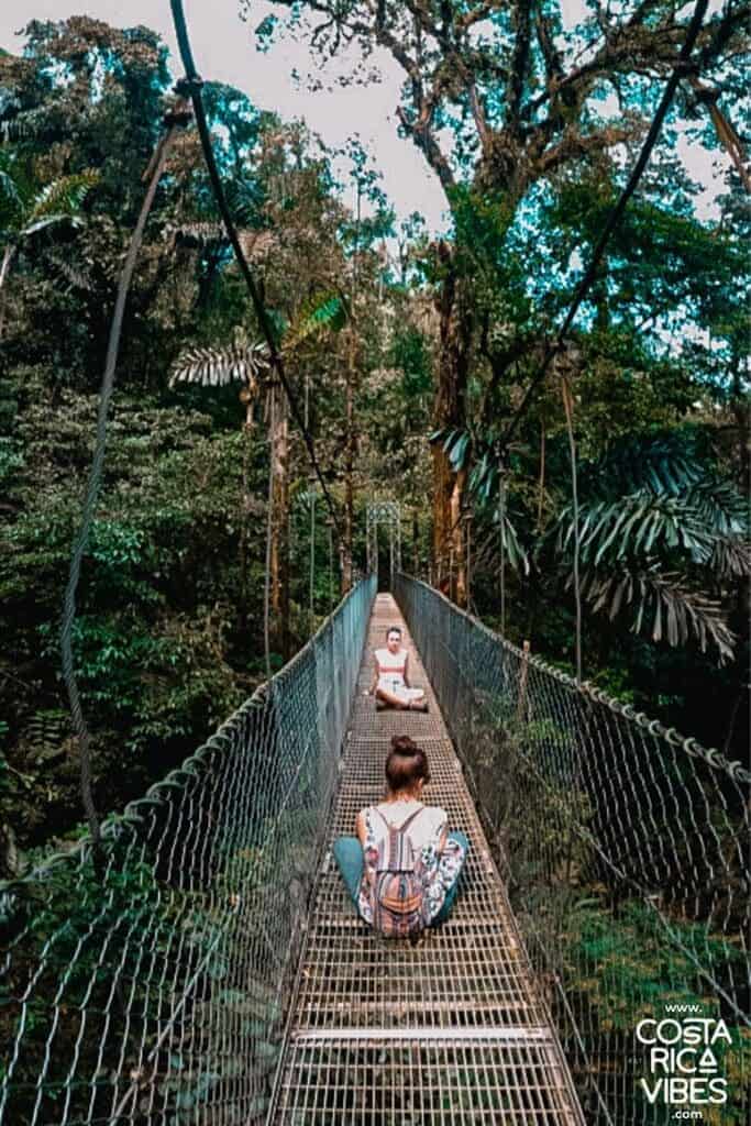 hanging bridge la fortuna people sitting