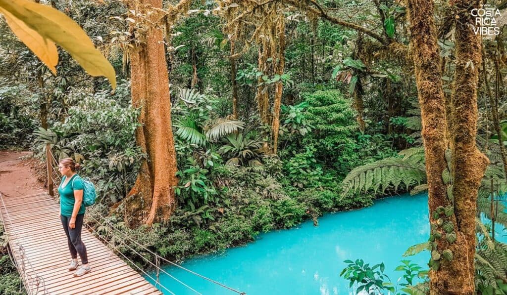 woman at rio celeste blue river